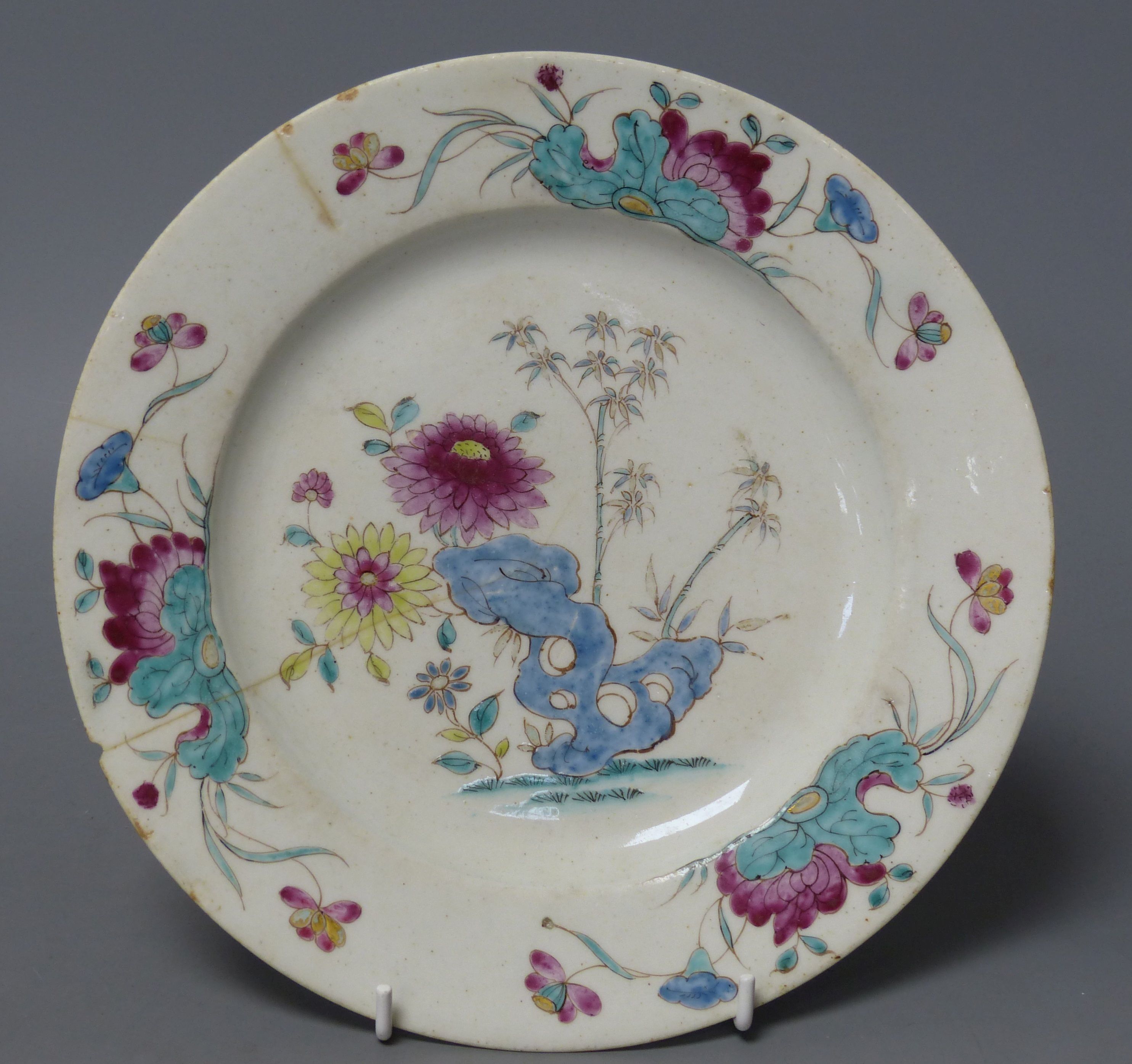 A Bow circular plate painted in famille rose style with chrysanthemums, c.1755, diameter 23cm